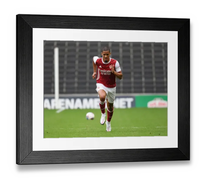 Framed Print : Arsenal's William Saliba Shines in Pre-Season Action Against MK Dons
