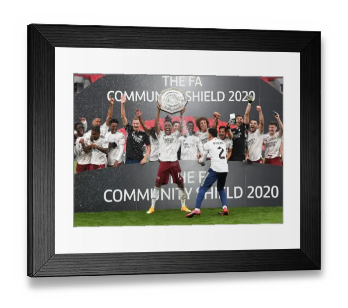 Framed Print : Arsenal's Aubameyang Celebrates FA Community Shield Victory with Champagne Spray