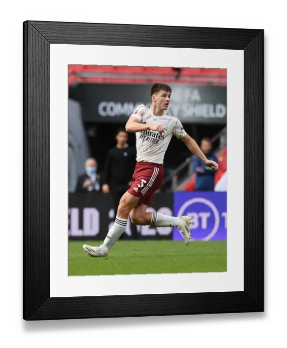Framed Print : Arsenal's Kieran Tierney Goes Head-to-Head with Liverpool in FA Community Shield Clash