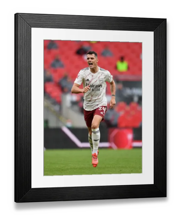 Framed Print : Arsenal's Xhaka in Action: FA Community Shield Clash Against Liverpool Framed Print : Arsenal's Xhaka in Action: FA Community Shield Clash Against Liverpool