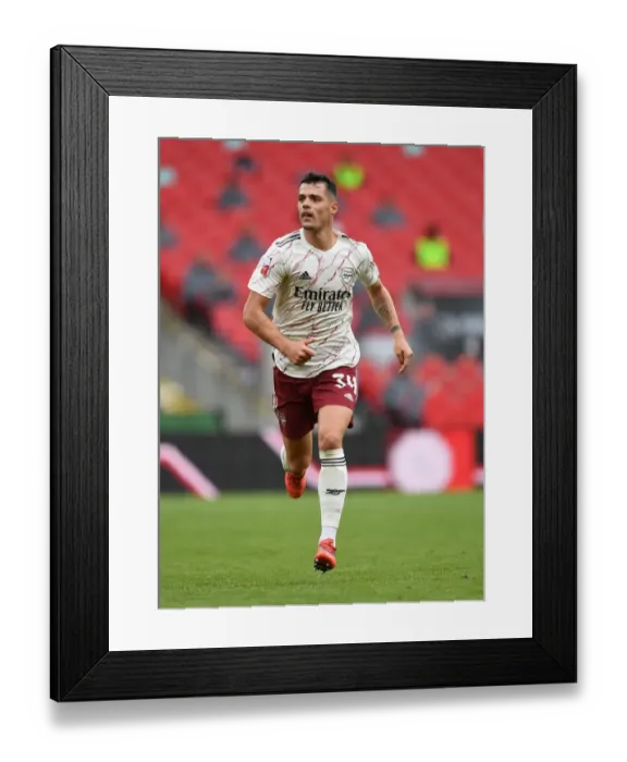 Framed Print : Arsenal's Xhaka Faces Off Against Liverpool in FA Community Shield Showdown