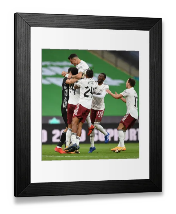 Framed Print : Arsenal's Triumph: Emi Martinez, Xhaka, and Maitland-Niles Celebrate FA Community Shield Victory over Liverpool in Penalty Shootout