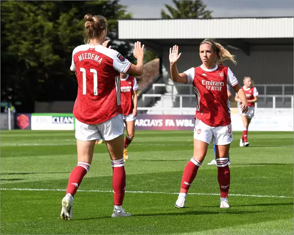 Arsenal Women's Victory: Vivianne Miedema and Jordan Nobbs Celebrate Goals Against Reading Women