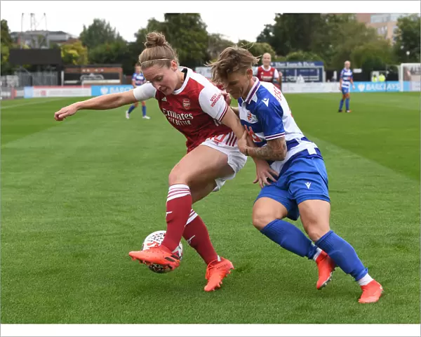 Arsenal Women vs Reading Women: Kim Little Shields the Ball in FA WSL Clash