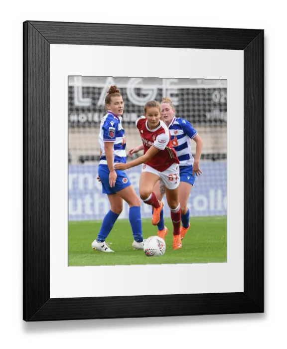 Framed Print : Arsenal Women vs Reading Women: Malin Gut Outmaneuvers Angharad James in FA WSL Clash