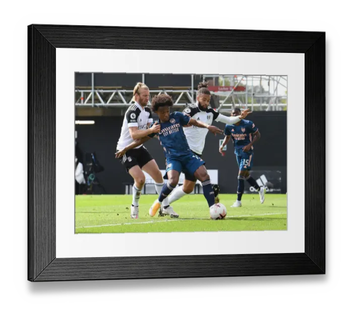 Framed Print : Willian Faces Off Against Fulham Defenders Ream and Hector in Arsenal's Premier League Clash Framed Print : Willian Faces Off Against Fulham Defenders Ream and Hector in Arsenal's Premier League Clash