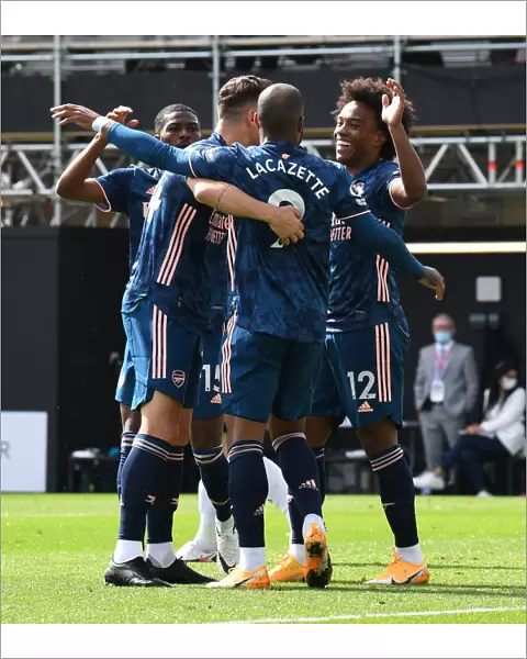 Arsenal's Lacazette, Xhaka, and Willian: Triumphant Goal Celebration in Arsenal vs Fulham, Premier League 2020-21