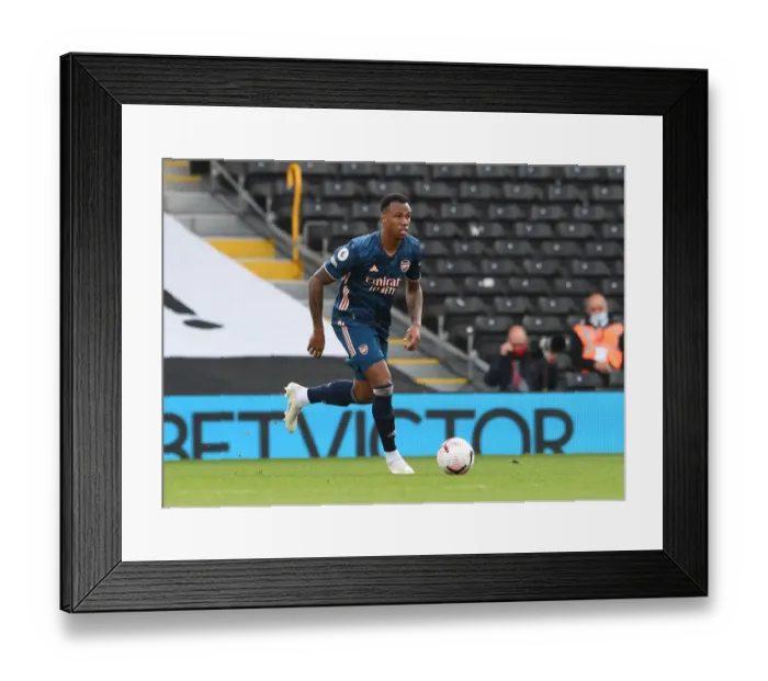 Framed Print : Gabriel Magalhaes Focuses in Arsenal's Premier League Clash Against Fulham Framed Print : Gabriel Magalhaes Focuses in Arsenal's Premier League Clash Against Fulham