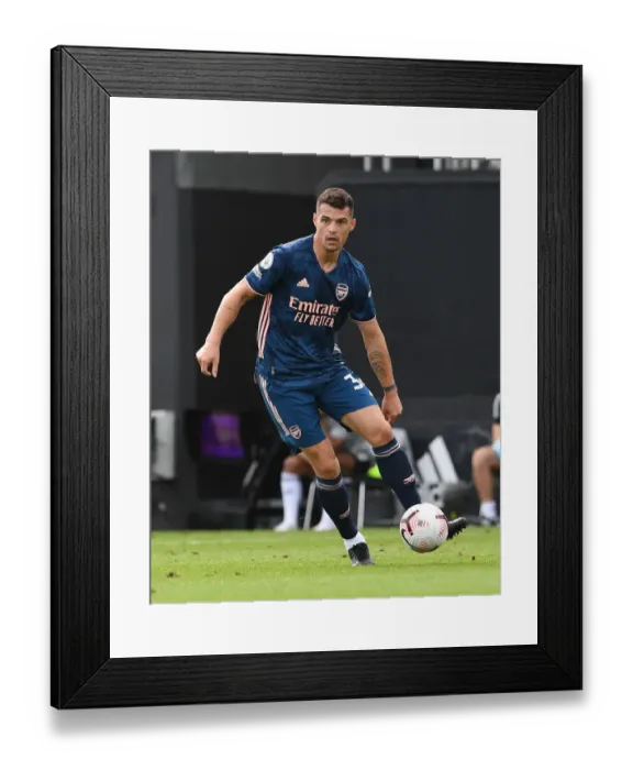 Framed Print : Granit Xhaka: Arsenal's Midfield Maestro in Action against Fulham, Premier League 2020-21