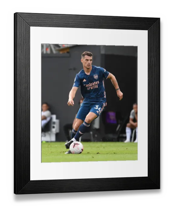 Framed Print : Granit Xhaka in Action: Arsenal's Midfield Maestro Shines Against Fulham, Premier League 2020-21 Framed Print : Granit Xhaka in Action: Arsenal's Midfield Maestro Shines Against Fulham, Premier League 2020-21
