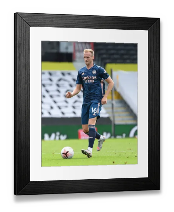 Framed Print : Rob Holding Focuses in Arsenal's Victory over Fulham (2020-21 Premier League)