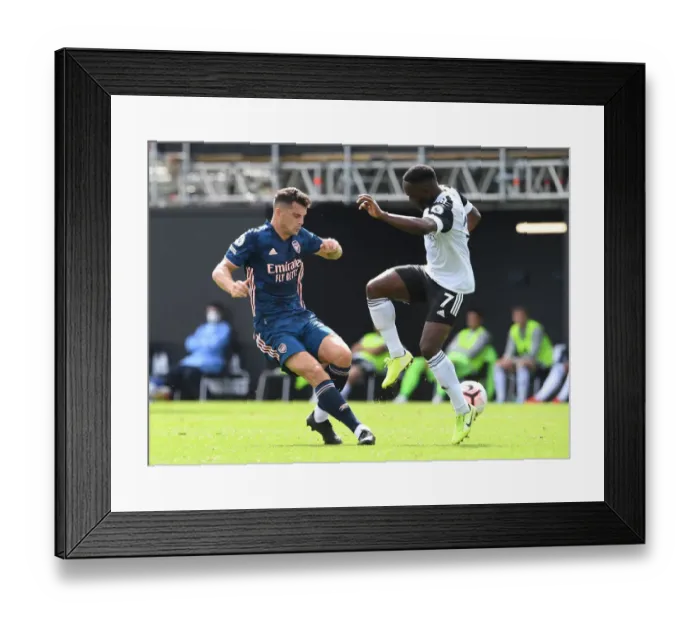 Framed Print : Xhaka vs Kebano: Intense Clash in Fulham vs Arsenal Premier League Match, 2020-21 Framed Print : Xhaka vs Kebano: Intense Clash in Fulham vs Arsenal Premier League Match, 2020-21