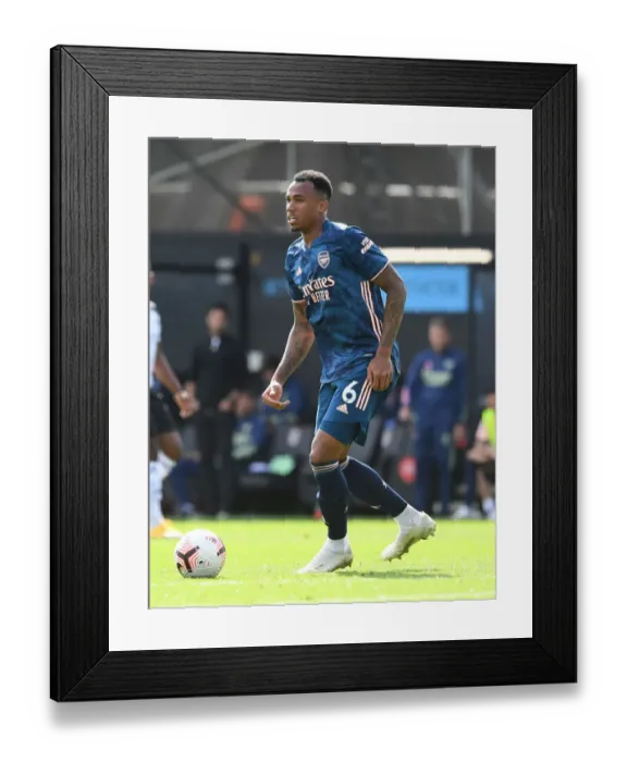 Framed Print : Gabriel Magalhaes Intense Concentration: Arsenal's Victory over Fulham (Fulham vs Arsenal, 2020-21 Premier League)
