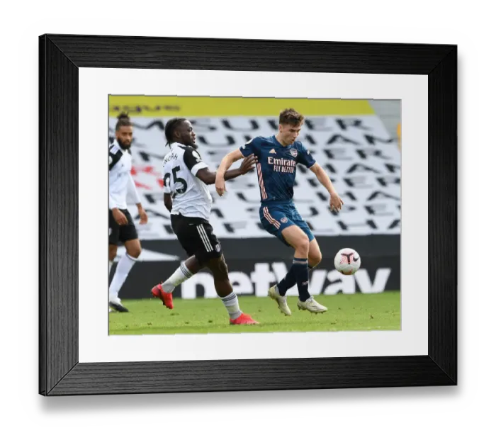 Framed Print : Arsenal's Kieran Tierney Outmaneuvers Fulham's Josh Onomah in Premier League Clash Framed Print : Arsenal's Kieran Tierney Outmaneuvers Fulham's Josh Onomah in Premier League Clash