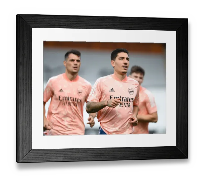 Framed Print : Arsenal's Hector Bellerin: Unwavering Concentration Before Fulham Clash, Premier League 2020-21 Framed Print : Arsenal's Hector Bellerin: Unwavering Concentration Before Fulham Clash, Premier League 2020-21
