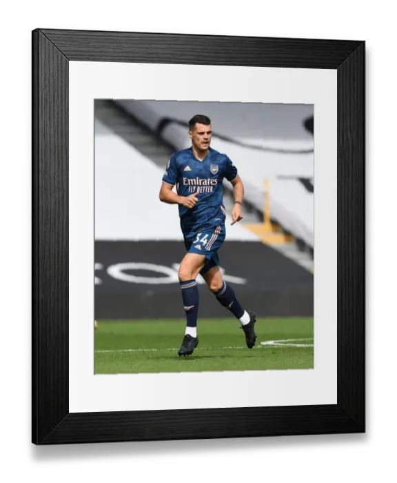 Framed Print : Granit Xhaka: Arsenal's Midfield Mastermind in Action against Fulham, Premier League 2020-21