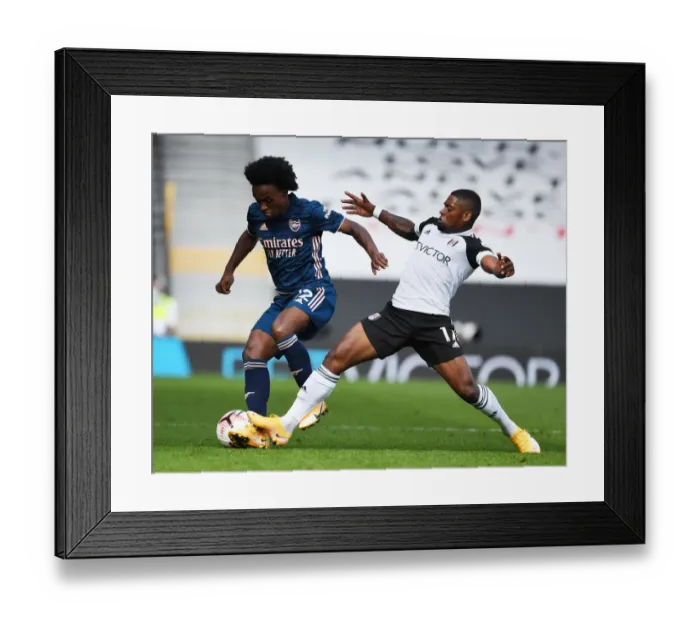 Framed Print : Willian vs Cavaleiro: Battle at Craven Cottage - Fulham vs Arsenal, Premier League 2020-21