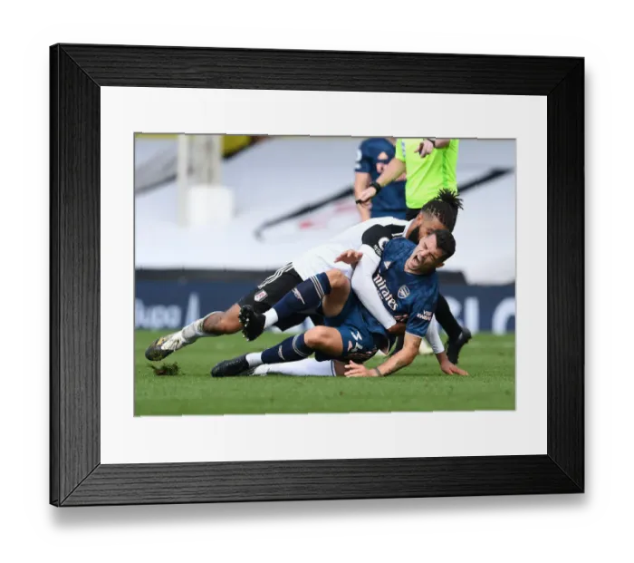 Framed Print : Xhaka vs Hector: A Football Rivalry Unfolds in the Fulham vs Arsenal Premier League Clash