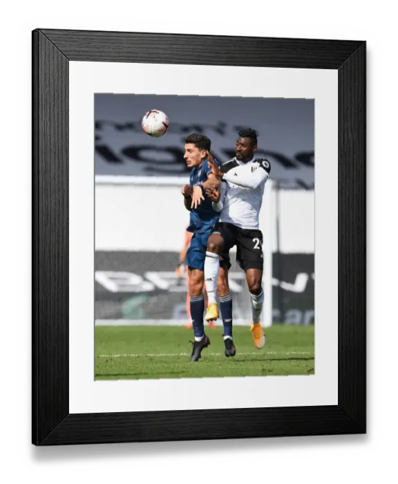 Framed Print : Fulham vs Arsenal: Hector Bellerin Clashes with Andre-Frank Anguissa in Premier League Showdown Framed Print : Fulham vs Arsenal: Hector Bellerin Clashes with Andre-Frank Anguissa in Premier League Showdown