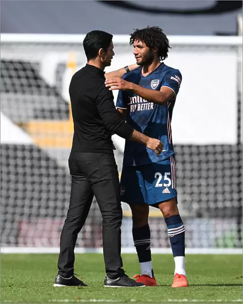 Arsenal Manager Mikel Arteta Consults with Mo Elneny Amidst Fulham Showdown