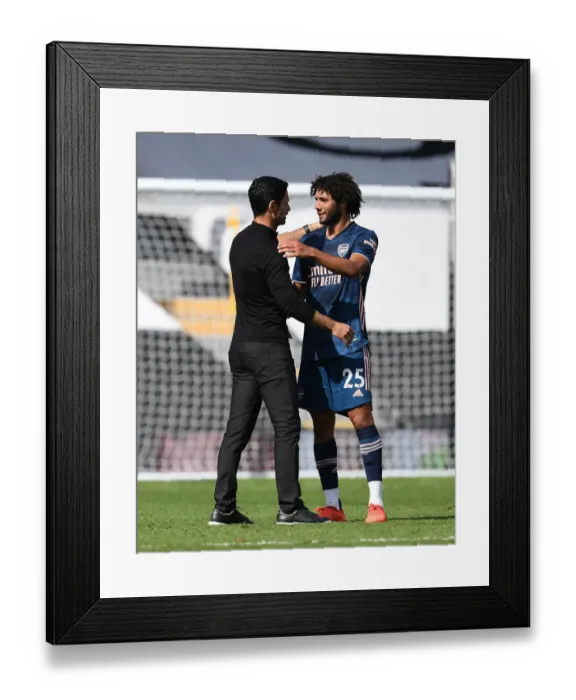 Framed Print : Arsenal Manager Mikel Arteta Consults with Mo Elneny Amidst Fulham Showdown Framed Print : Arsenal Manager Mikel Arteta Consults with Mo Elneny Amidst Fulham Showdown