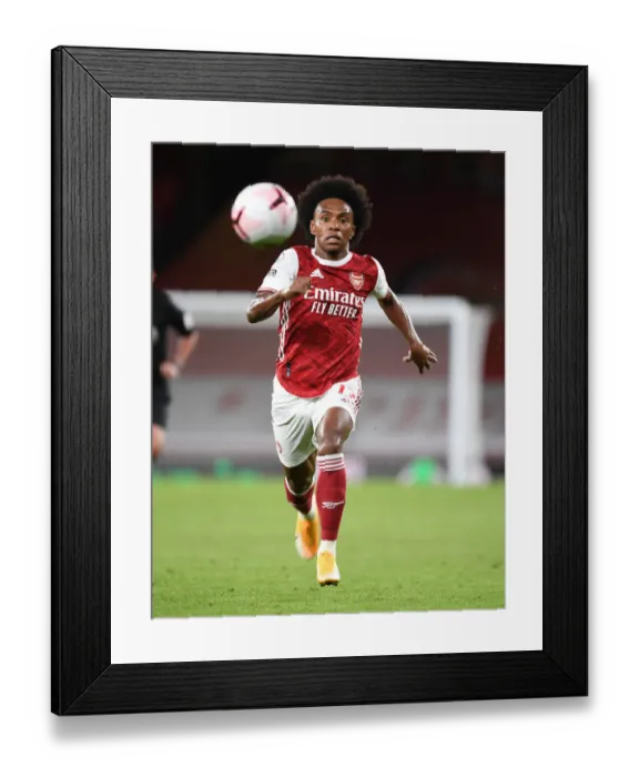 Framed Print : Arsenal's Willian Fights for Possession Against West Ham in Premier League Clash Framed Print : Arsenal's Willian Fights for Possession Against West Ham in Premier League Clash
