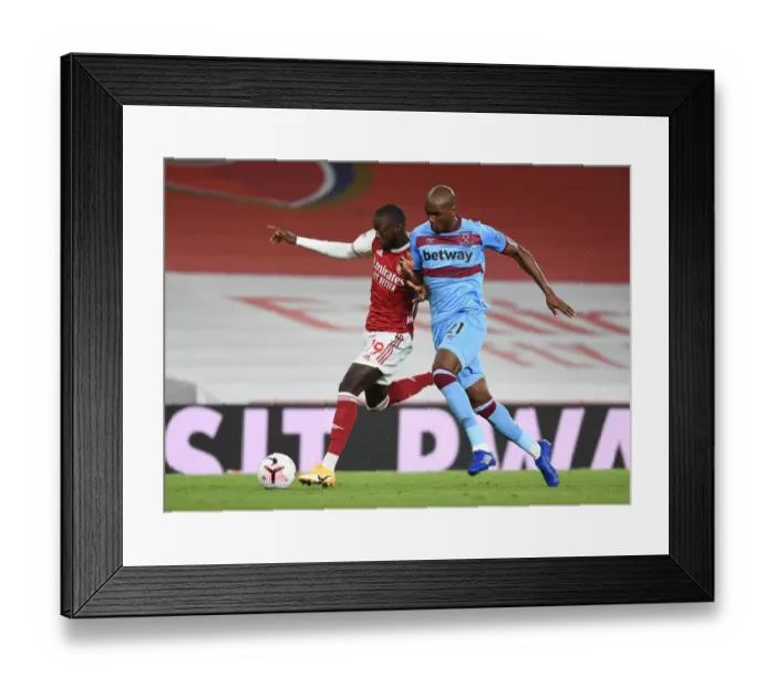 Framed Print : Pepe Outwits Ogbonna: Thrilling Premier League Clash - Arsenal vs. West Ham Framed Print : Pepe Outwits Ogbonna: Thrilling Premier League Clash - Arsenal vs. West Ham