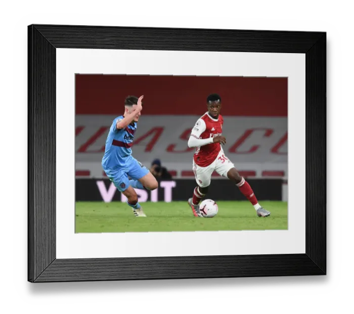 Framed Print : Arsenal's Eddie Nketiah Outmaneuvers West Ham's Declan Rice in Premier League Clash Framed Print : Arsenal's Eddie Nketiah Outmaneuvers West Ham's Declan Rice in Premier League Clash