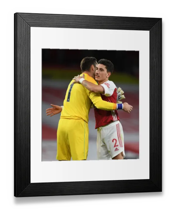 Framed Print : Compassionate Moment: Hector Bellerin Comforts Emotional Lukas Fabianski After Intense Arsenal vs. West Ham Clash (2020-21) Framed Print : Compassionate Moment: Hector Bellerin Comforts Emotional Lukas Fabianski After Intense Arsenal vs. West Ham Clash (2020-21)