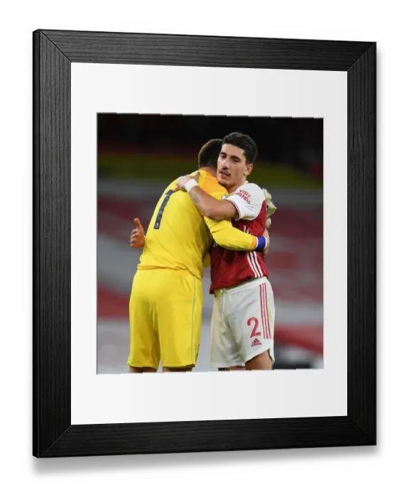 Framed Print : Arsenal's Hector Bellerin Consoles West Ham's Lukas Fabianski After Intense Arsenal v West Ham United Match, 2020-21 Premier League Framed Print : Arsenal's Hector Bellerin Consoles West Ham's Lukas Fabianski After Intense Arsenal v West Ham United Match, 2020-21 Premier League