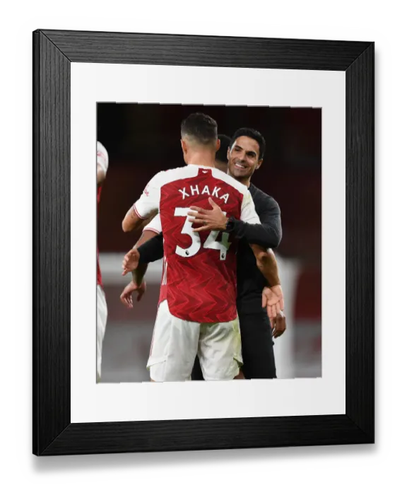 Framed Print : Arsenal's Victory: Mikel Arteta Embraces Granit Xhaka after Arsenal v West Ham United (2020-21) Framed Print : Arsenal's Victory: Mikel Arteta Embraces Granit Xhaka after Arsenal v West Ham United (2020-21)