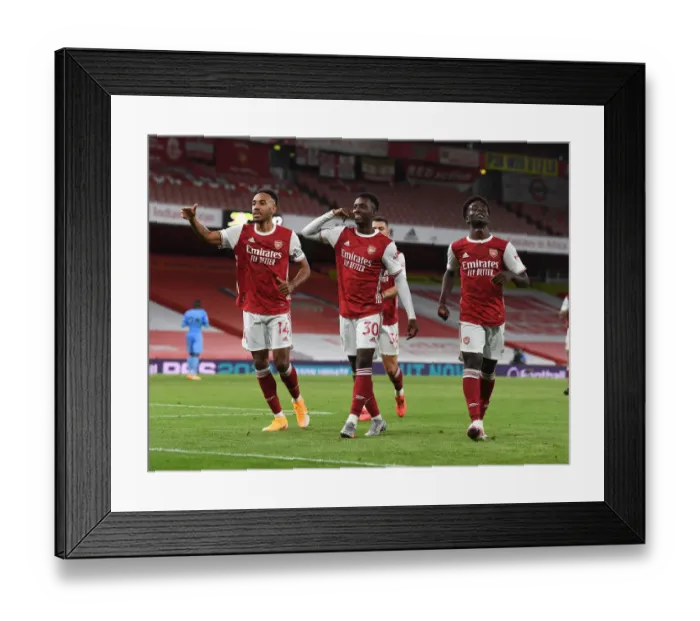 Framed Print : Arsenal Celebrate: Nketiah, Aubameyang, Saka Score Against West Ham