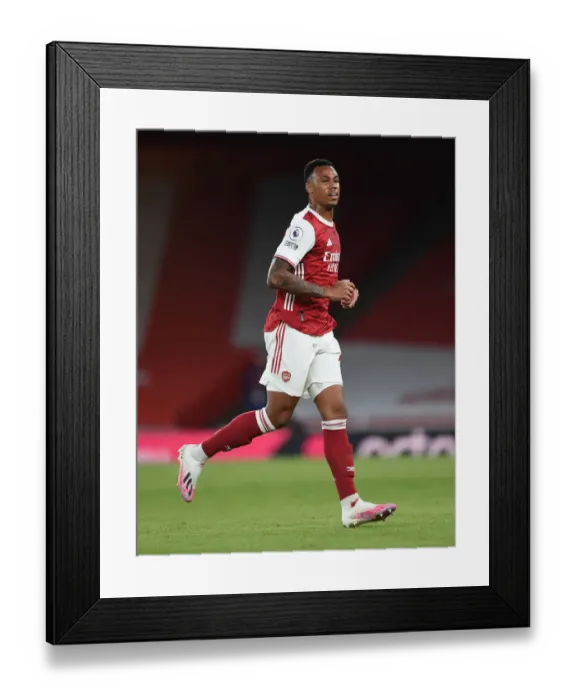 Framed Print : Arsenal's Gabriel Magalhaes in Action: Premier League Clash Against West Ham United (2020-21) - Emirates Stadium Showdown Framed Print : Arsenal's Gabriel Magalhaes in Action: Premier League Clash Against West Ham United (2020-21) - Emirates Stadium Showdown