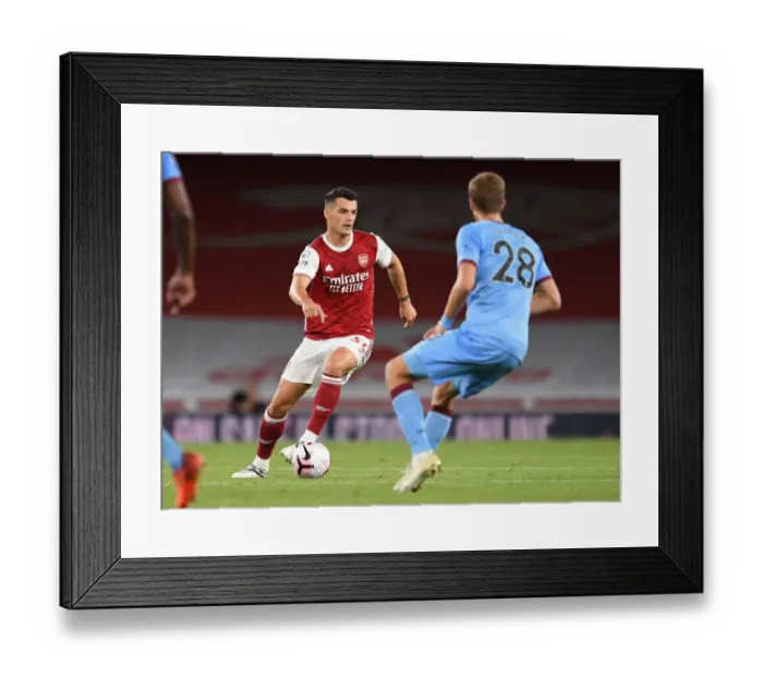 Framed Print : Granit Xhaka in Action: Arsenal vs. West Ham United, Premier League 2020-21 Framed Print : Granit Xhaka in Action: Arsenal vs. West Ham United, Premier League 2020-21