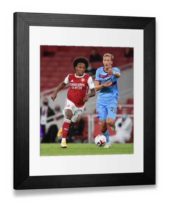 Framed Print : Arsenal vs. West Ham United: Willian Clashes with Soucek in Premier League Showdown