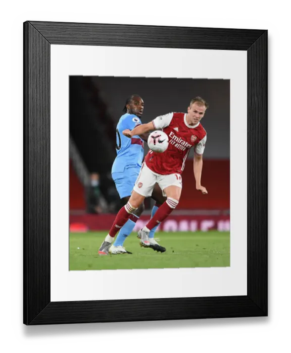 Framed Print : Arsenal's Rob Holding Wins the Ball from West Ham's Michail Antonio in 2020-21 Premier League Clash Framed Print : Arsenal's Rob Holding Wins the Ball from West Ham's Michail Antonio in 2020-21 Premier League Clash