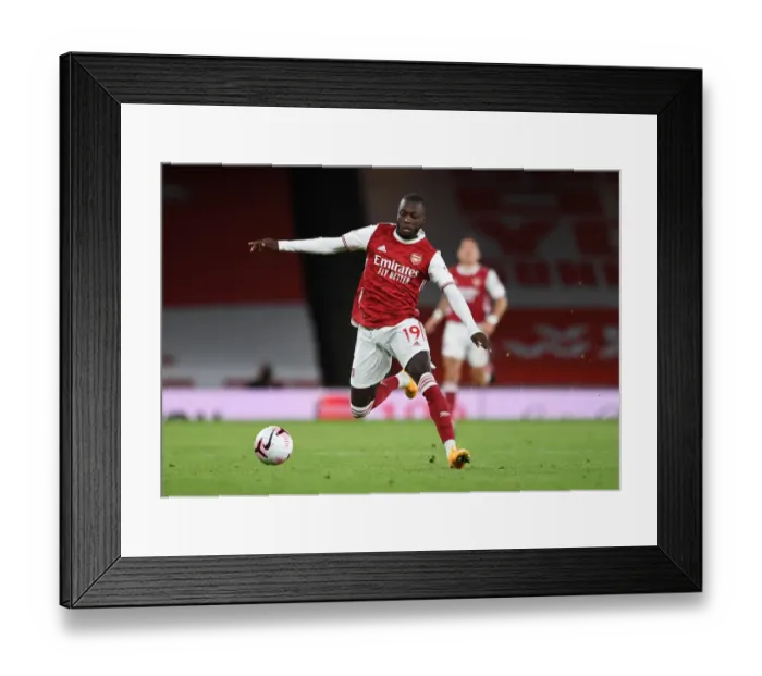 Framed Print : Arsenal's Nicolas Pepe in Action against West Ham United - Premier League 2020-21 Framed Print : Arsenal's Nicolas Pepe in Action against West Ham United - Premier League 2020-21