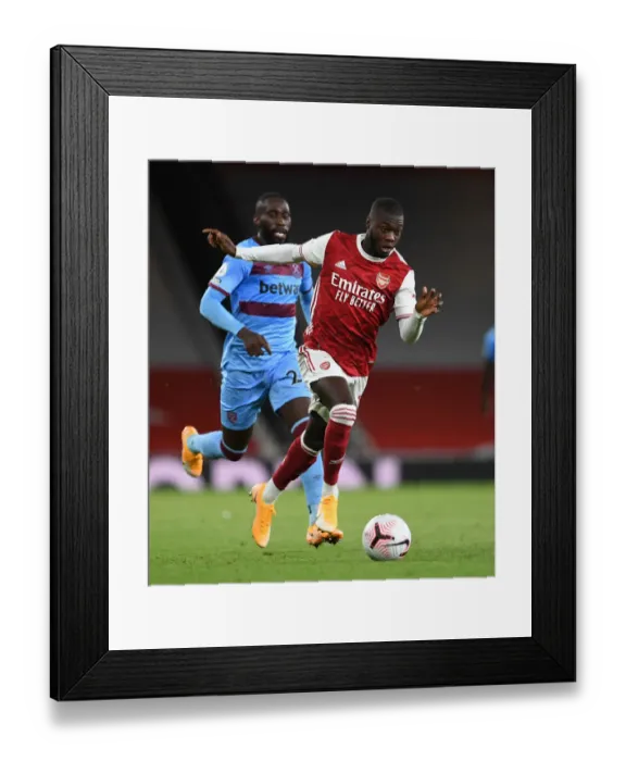 Framed Print : Arsenal's Pepe in Action: Arsenal vs. West Ham United, Premier League 2020-21 Framed Print : Arsenal's Pepe in Action: Arsenal vs. West Ham United, Premier League 2020-21