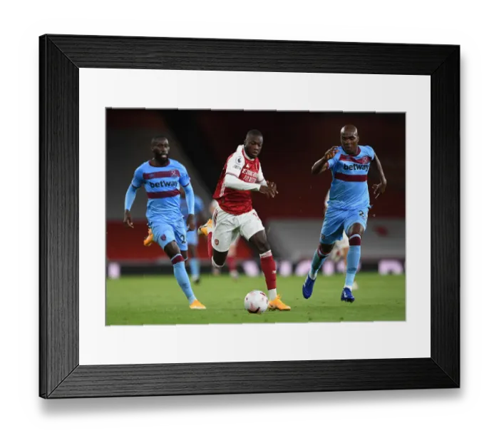 Framed Print : Pepe vs Ogbonna: Intense Face-Off in Arsenal's Battle Against West Ham Framed Print : Pepe vs Ogbonna: Intense Face-Off in Arsenal's Battle Against West Ham