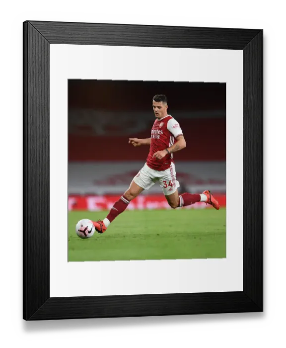 Framed Print : Granit Xhaka: Arsenal's Midfield Maestro in Action against West Ham United, Premier League 2020-21 Framed Print : Granit Xhaka: Arsenal's Midfield Maestro in Action against West Ham United, Premier League 2020-21
