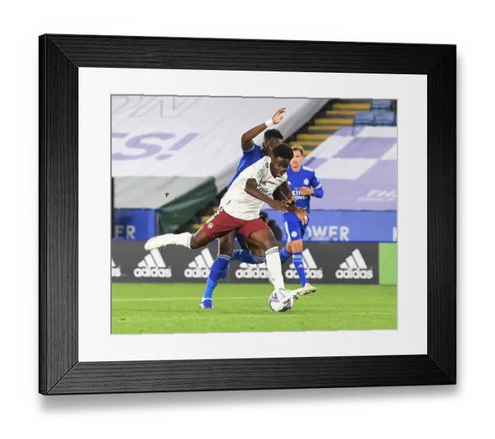 Framed Print : Leicester vs Arsenal: Bukayo Saka vs Daniel Amartey Clash in Carabao Cup Showdown Framed Print : Leicester vs Arsenal: Bukayo Saka vs Daniel Amartey Clash in Carabao Cup Showdown