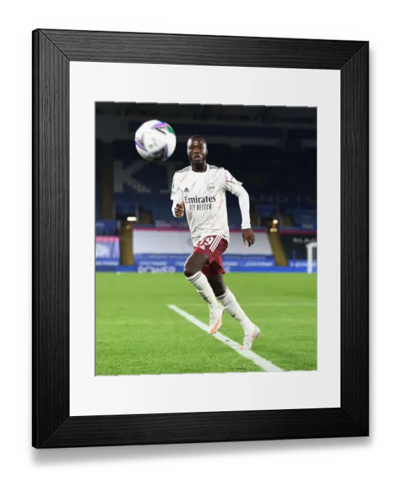 Framed Print : Arsenal's Nicolas Pepe in Action against Leicester City in Carabao Cup Clash Framed Print : Arsenal's Nicolas Pepe in Action against Leicester City in Carabao Cup Clash
