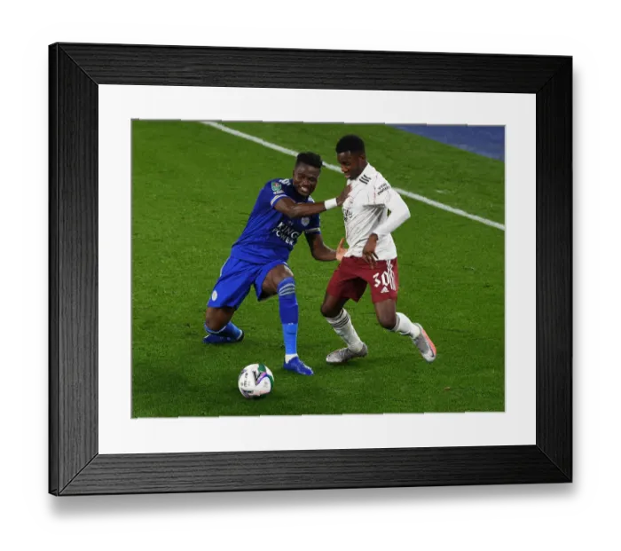 Framed Print : Nketiah vs Amartey: A Carabao Cup Battle at The King Power Stadium Framed Print : Nketiah vs Amartey: A Carabao Cup Battle at The King Power Stadium