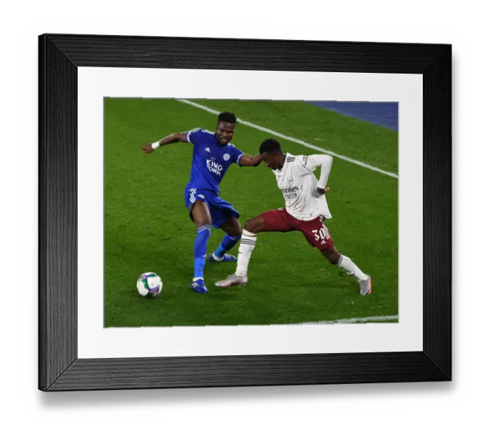 Framed Print : Arsenal's Eddie Nketiah Faces Off Against Leicester's Daniel Amartey in Carabao Cup Clash Framed Print : Arsenal's Eddie Nketiah Faces Off Against Leicester's Daniel Amartey in Carabao Cup Clash