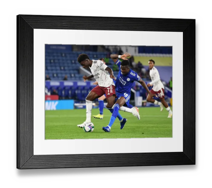 Framed Print : Bukayo Saka Fouled by Amartey: Leicester vs Arsenal Carabao Cup Showdown