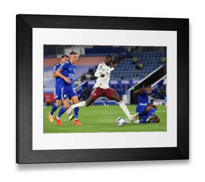 Framed Print : Pepe Faces Off Against Thomas and Morgan: Leicester City vs Arsenal in Carabao Cup Clash