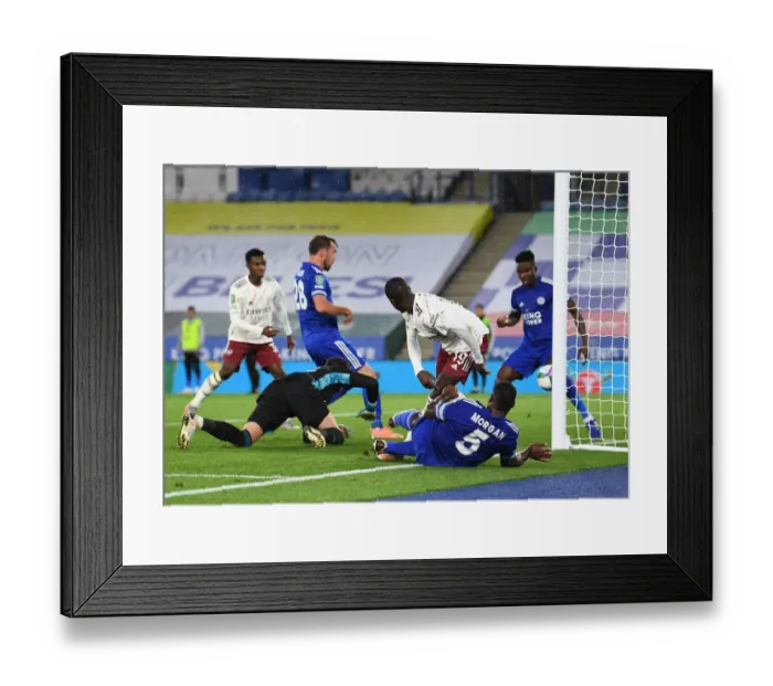 Framed Print : Leicester City Stuns Arsenal: Nicolas Pepe Witnesses Fuchs Goal in Carabao Cup Upset