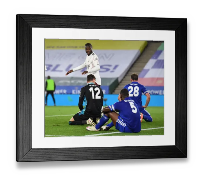 Framed Print : Nicolas Pepe Celebrates Arsenal's Goal Against Leicester City in Carabao Cup Third Round