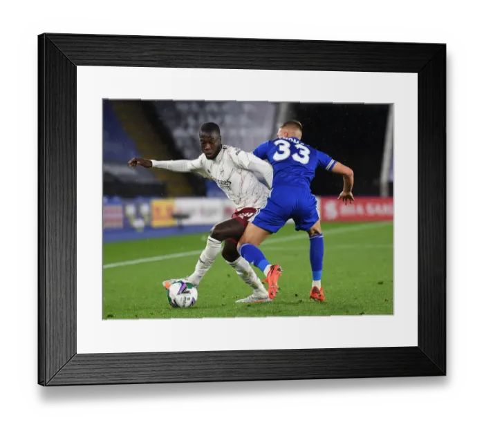 Framed Print : Leicester City vs Arsenal: Pepe Clashes with Thomas in Carabao Cup Showdown