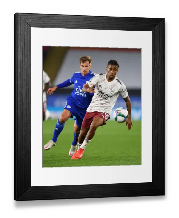Framed Print : Reiss Nelson vs Marc Albrighton: Battle at The King Power Stadium - Leicester City vs Arsenal Carabao Cup Clash